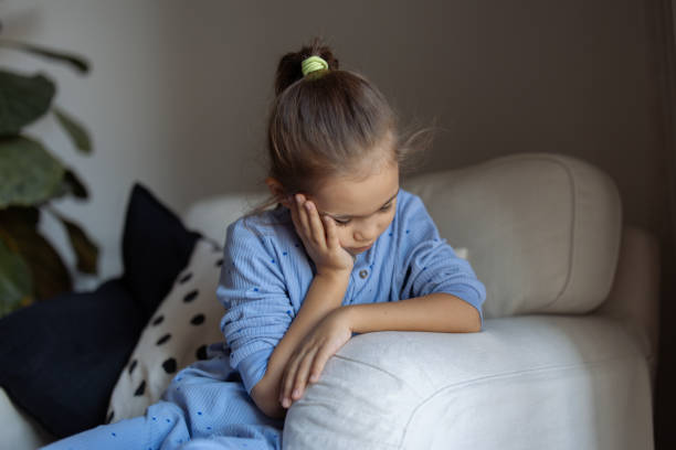 istock Little girl having an earache 2182174294