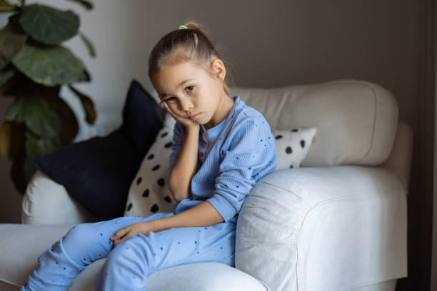 istock Little girl having an earache 2182174787