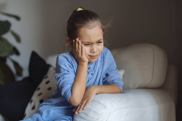 istock Little girl having an earache 2182174918