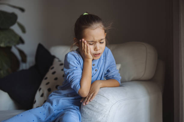 istock Little girl having an earache 2182178368