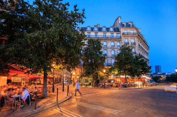 istock Sidewalk cafe in Paris at night 2182181626