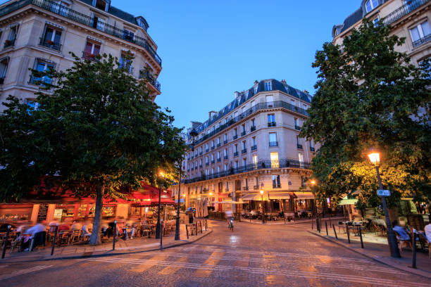 istock Sidewalk cafe in Paris at night 2182181640