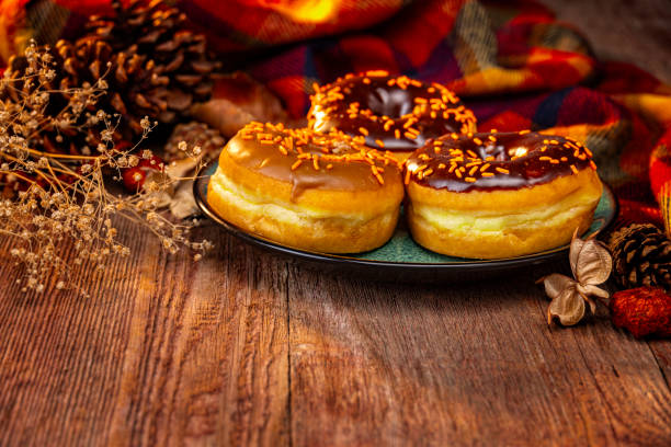 Autumn Holiday Donuts on a Retro Wood Background