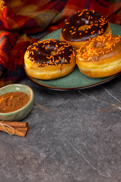 istock Autumn Holiday Donuts on a  Gray Marble Background 2182182318