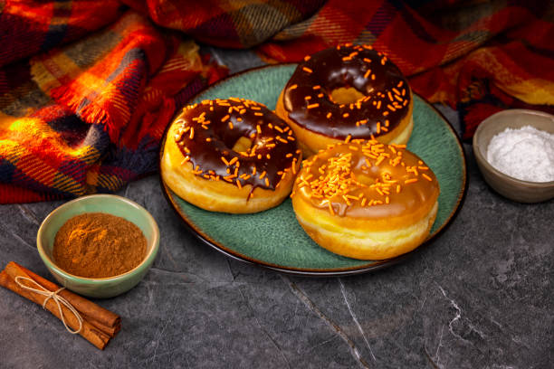 istock Autumn Holiday Donuts on a  Gray Marble Background 2182182319
