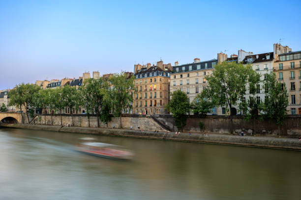 istock Seine River and boat Paris, France 2182182389