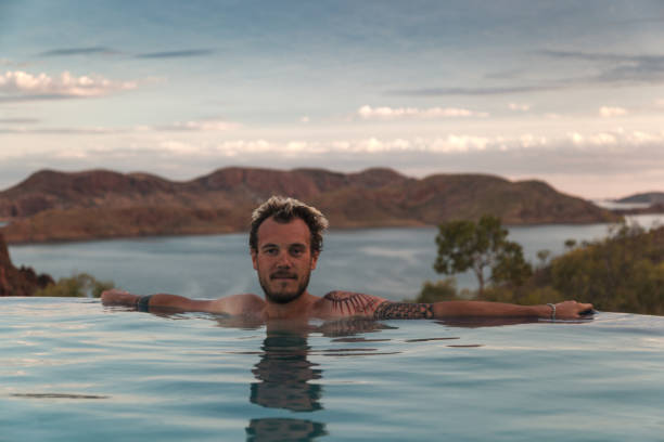 istock Relaxing in the infinity pool overlooking Lake Argyle at sunset in Western Australia 2182187716