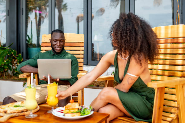 istock Relaxing Outdoor Cafe Scene with Friends and Refreshing Drinks 2182188216