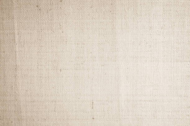istock Brown sackcloth woven texture background in natural pattern. Jute hessian burlap, linen background in light beige cream color blank. Weaving canvas fiber line cotton cloth textured as organic. 2182188629