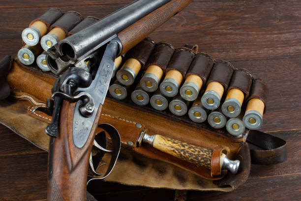 istock double barreled side shotgun with cartridges in bandolier. 2182191909