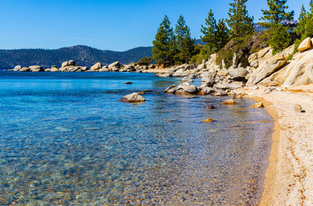 istock Turquoise Waters and Granite Boulders Along Hidden Beach 2182195538
