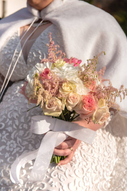 istock the bride with a vintage wedding bouquet 2182196238