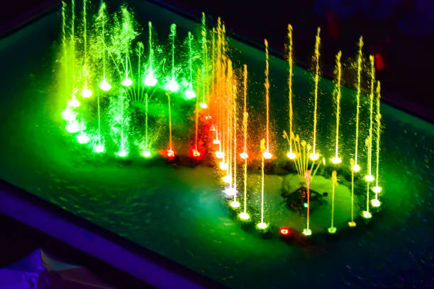 Illuminated fountain near Hagia Sophia in the evening in Istanbul. Sultanahmet district