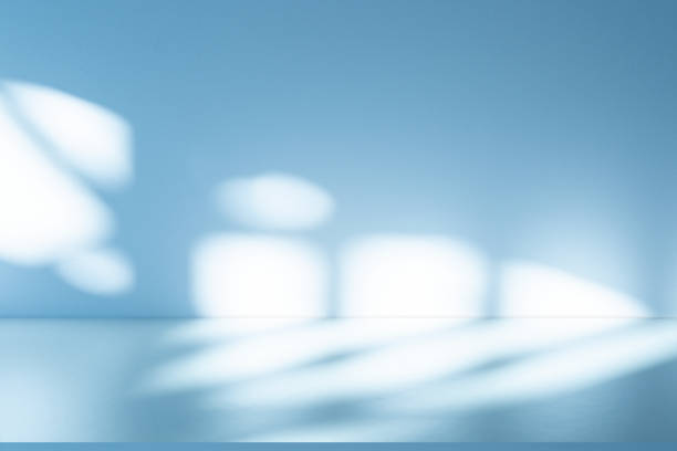 istock Wall interior background, studio, and backdrops show products. with shadow from window color white and blue light. background for text insertion and presentation of product 2182207772