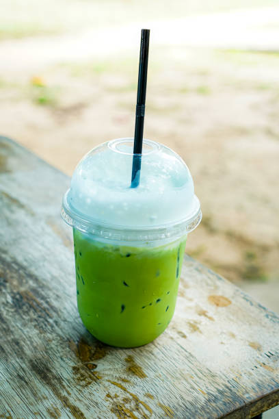 Close up of kiwi juice. Kiwi isolated on grey background, Selective focus, Kiwi have juice rich in vitamins and energy. Fresh fruits concept.