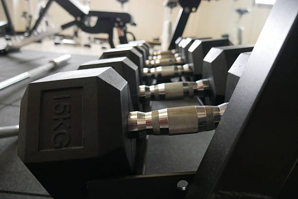 istock Close-Up of Black and Silver Drip Dumbbell with Blurred Background 2182211248