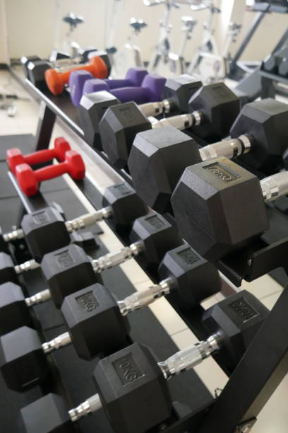 istock Close-Up of Black and Silver Drip Dumbbell with Blurred Background 2182211251