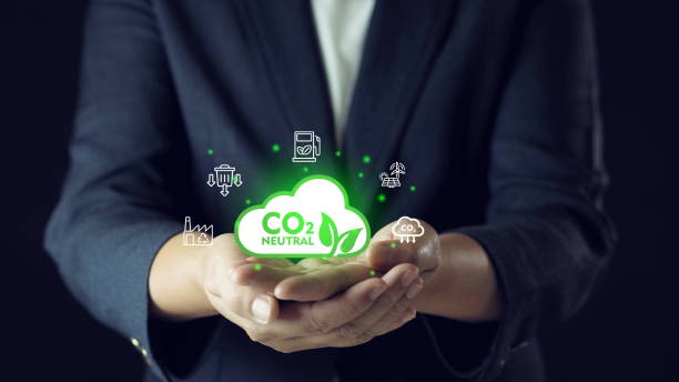istock businessman presents a strategy for carbon reduction that aims to reduce carbon dioxide emissions, reduce carbon dioxide emissions, carbon credits to combat global warming. 2182212665