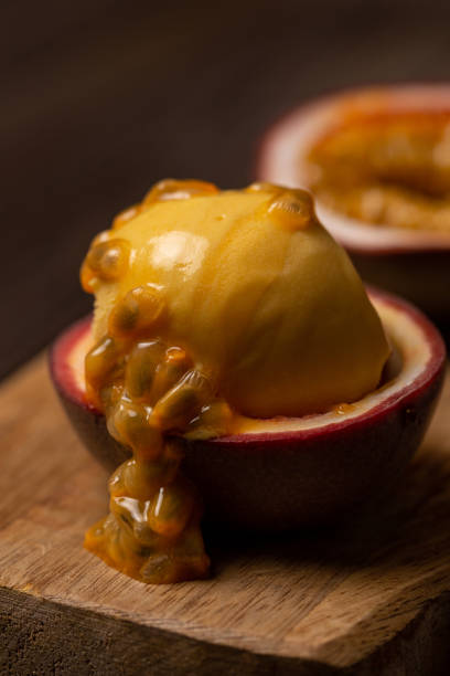 istock A ball of mango and passion fruit ice cream 2182215093