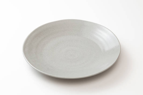 istock Gray round plate on a white background. 2182219695