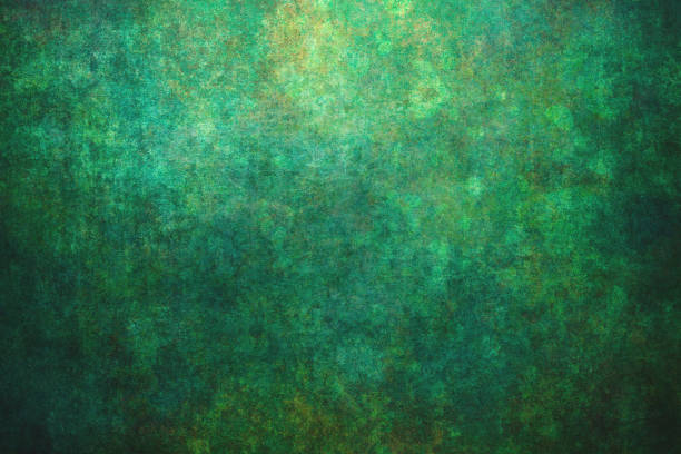 This grungy, textured background showcases a distressed green wall with scratches, stains, and peeling plaster, creating an aged and weathered effect. The full-frame image captures the rough, abstract details, ideal for adding a vintage or grunge aesthetic. With no people or distractions, this backdrop is perfect for creative projects needing a raw, textured effect.