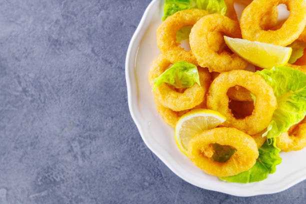 istock fried onion rings or calamari rings 2182227274