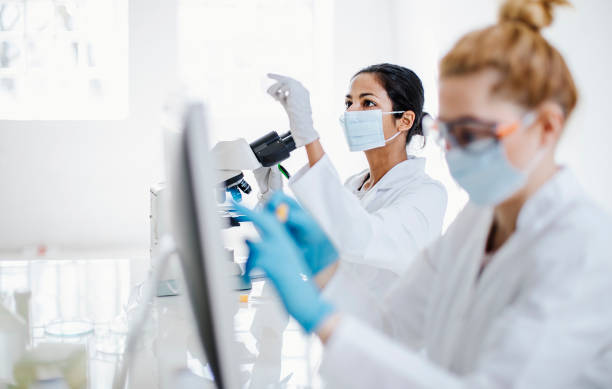istock Indian Female Scientist Examining Specimens in Laboratory 2182230081