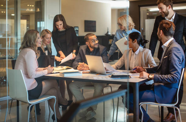 istock Diverse Team of Professionals Engaged in Creative Discussion at Work 2182230952