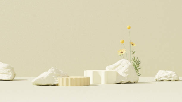 istock 3D rendering of a yellow empty podium display space for product mockup, set against a minimal landscape background. 2182238950