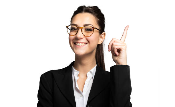istock Young businesswoman having an idea pointing her forefinger up 2182243998