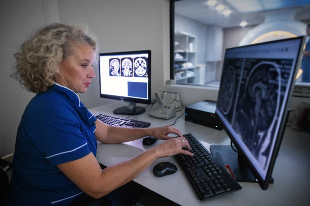 istock Female Radiologist Analyzes the MRI Images. 2182244113