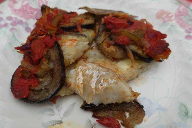 istock Provencal tian with cod after cooking in the oven Meal served 2182244315