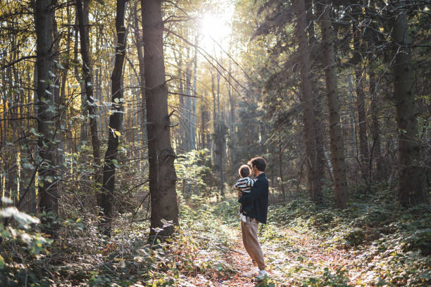 istock Father and son spending time in the forest 2182247224