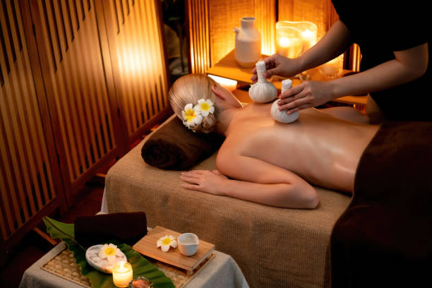 istock Hot herbal ball spa massage body treatment. Quiescent 2182249623