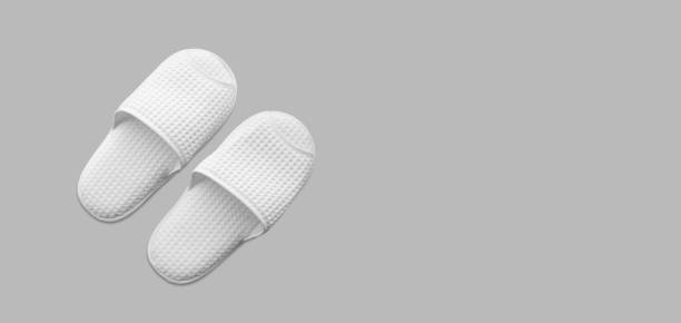 istock White slippers shoes die cut. 2182249735