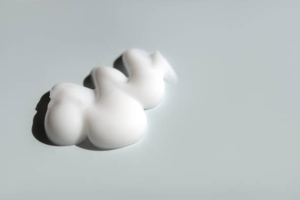 istock A smear of cream on a light background. Beauty concept. 2182255384