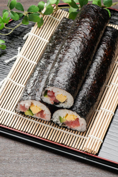 istock Eho-maki are thick sushi rolls which is believed to bring good fortune if eaten while facing the year's 