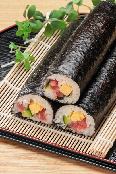 istock Eho-maki are thick sushi rolls which is believed to bring good fortune if eaten while facing the year's 