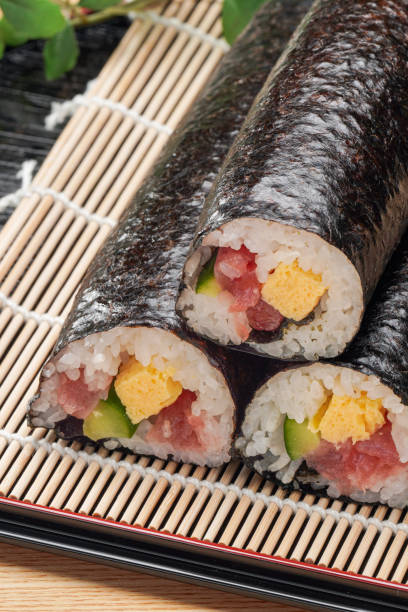 istock Eho-maki are thick sushi rolls which is believed to bring good fortune if eaten while facing the year's 