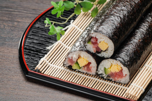 istock Eho-maki are thick sushi rolls which is believed to bring good fortune if eaten while facing the year's 