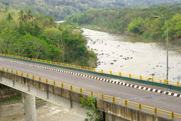istock A highway road bridge on a river in the mountains 2182276915
