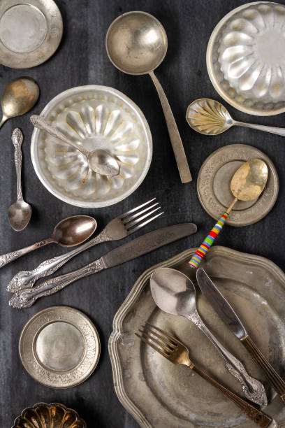 istock Vintage pewter plates, bowls and cutlery 2182279093