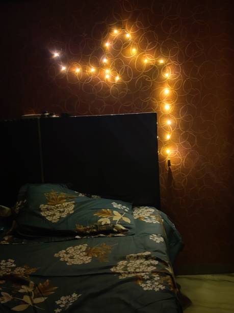 istock Fairy lights above bed - stock photo 2182286049