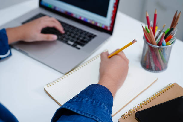 istock Teenage using tablet for communication, search data internet website to learn. 2182293227