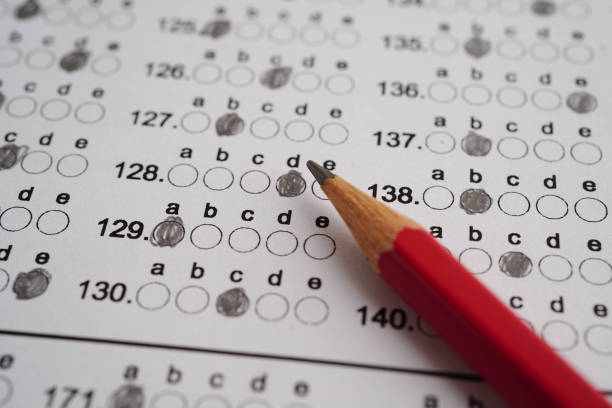 istock Answer sheets with pencil drawing fill to select choice, education concept. 2182295857