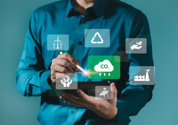 Reduce CO2 emissions Humans use software to reduce CO2 emissions to limit global warming and climate change for the environment, global warming, sustainable development and green business. reducir las emisiones de co2 los seres humanos utilizan software para reducir las emisiones de co2 para limitar el calentamiento global y el cambio climático para el medio ambiente, el calentamiento global, el desarrollo sostenible y los negocios verdes.