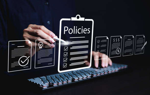 Policy documentation and compliance concept. A person reviews digital document labeled 