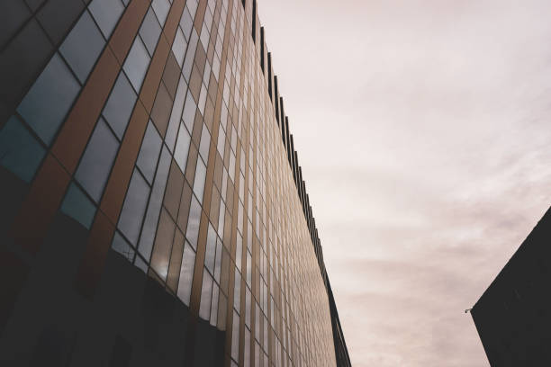 istock Low angle of modern building during the evening 2182306105
