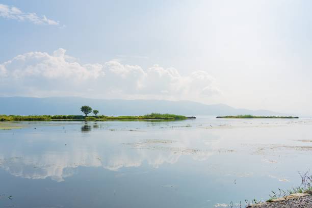 istock Serene lake landscape with reflections 2182309584