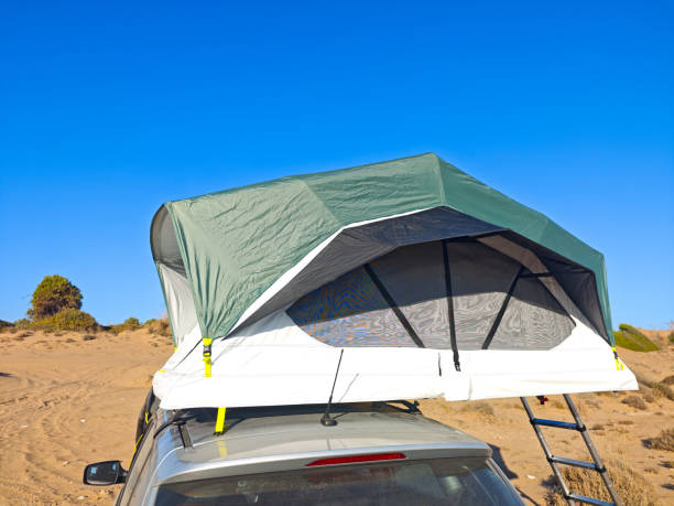 istock car tent on the beach 2182316674